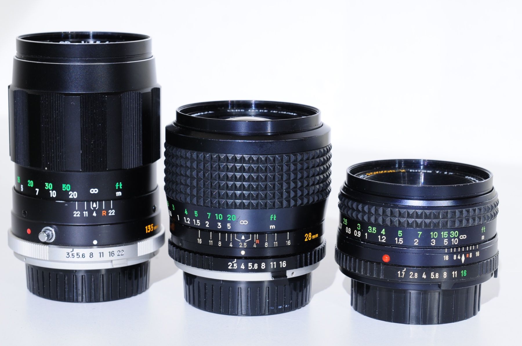 Minolta Obiettivi: 3 Minolta Objektive MC, MD Rokkor top Zustand – Usato da Rheinfelden venduto da Fotomechaniker-AD 2