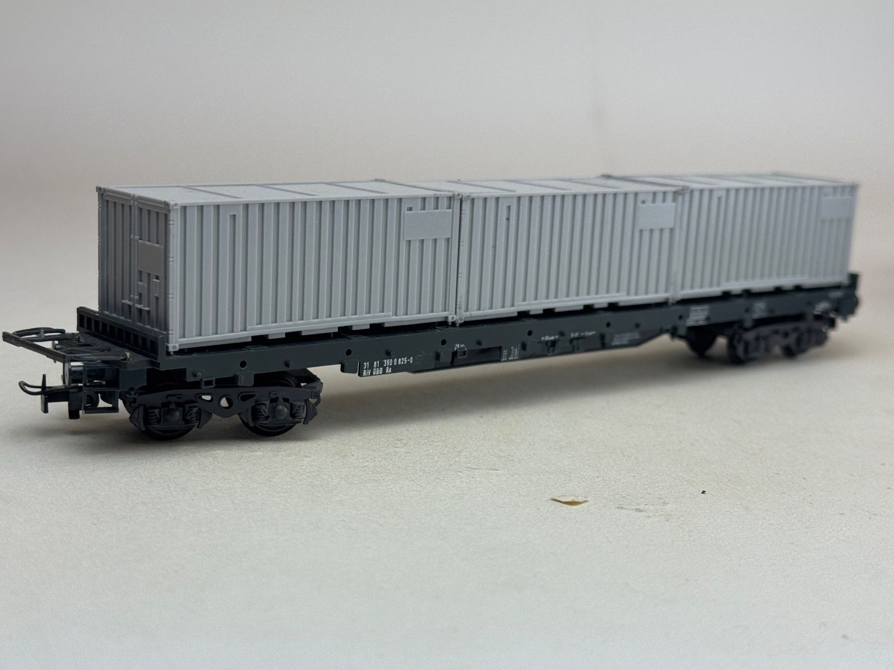 Liliput Trains électriques: EB- Liliput Containerwagon 3 graue 20 Ft. Container – D'occasion à Elm par Wikmtz
