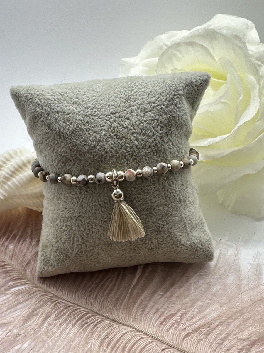 Bracciali & Braccialetti: Jaspis Armband mit Quaste – Nuovo e nell'imballaggio originale da Niederglatt ZH venduto da Silberschmuck-design