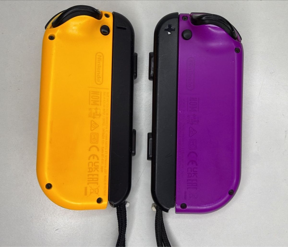 Nintendo Controller: Nintendo Switch Joy-Con Set Yellow and Purple Pair – Usato da Ehrendingen venduto da bubulence 1