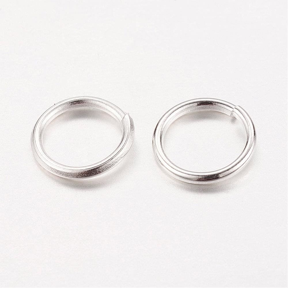 Perle (finte): 50 Spaltringe (einfach) versilbert   6mm – Nuovo (secondo la descrizione) da Alpnachstad venduto da perlengaby