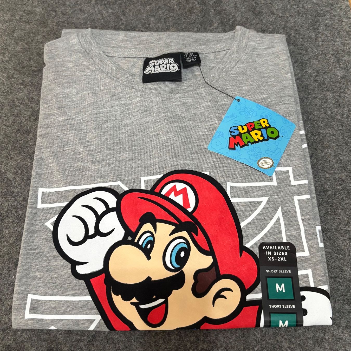 T-shirt: Super Mario T-Shirt (Größe M) – Nuovo e nell'imballaggio originale da Mollis venduto da GamingCorner 1