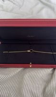 Cartier Love Armband an einer Kette