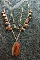 Collier mit Anhänger braun guter Zustand