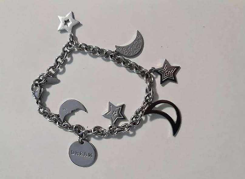 Bracciali & Braccialetti: Bracciale in acciaio ciondoli – Usato da Lumino venduto da ghi_x8jl