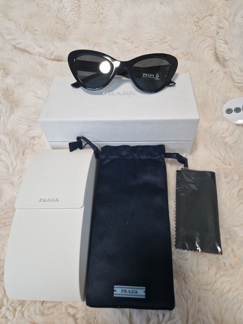 Prada Occhiali & Lenti: PRADA Sonnenbrillen – Nuovo e nell'imballaggio originale da Luzern venduto da Oceane08