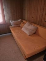 Sofa orange mit Kissen gute Zustand