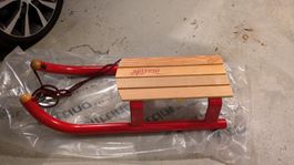 Schlitten Slittino rot Holz und Metall