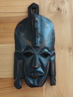 Masque tribal en bois sculpté