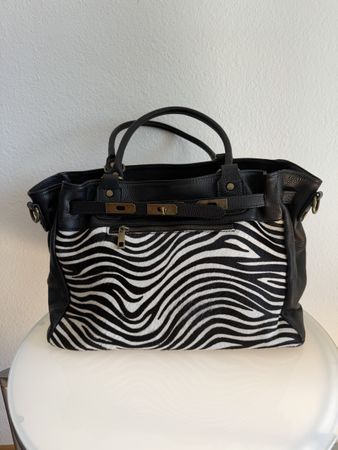 Sac en cuir avec fourrure de poney, fabriqué en Italie