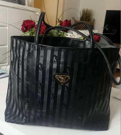 Handtasche Mollerus schwarz gestreift guter Zustand