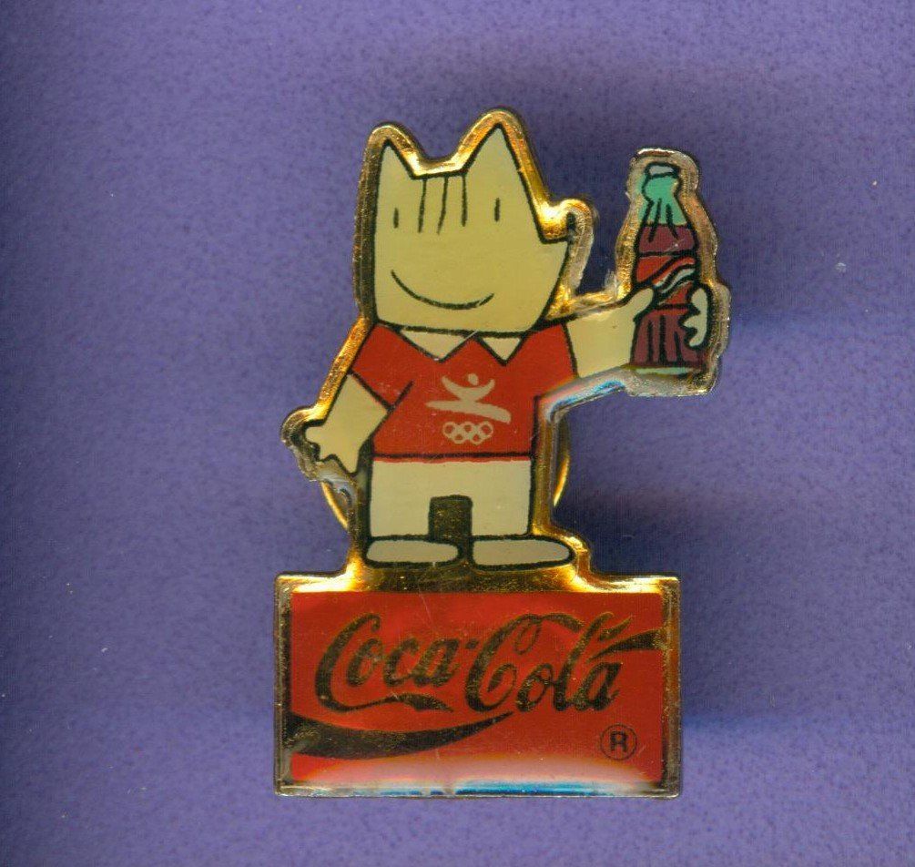 Coca-Cola Placchette & Badge: Coca Cola  Barcelona '92  Maskottchen – Usato da Winterthur venduto da Sammleroase