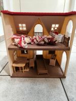 Maison Sylvanian Families avec figurines et meubles