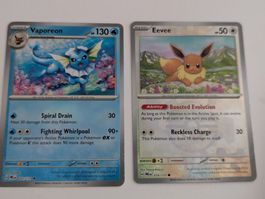 Eevee + Vaporeon Prismatic Evolutions Poke Ball Pokemon Card