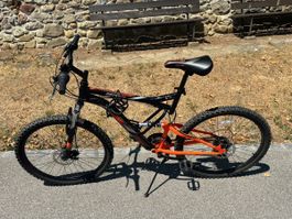 Mountainbike vollgefedert schwarz orange neuwertig