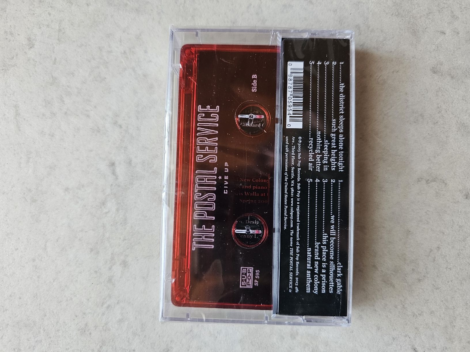 Musicassette: The Postal Service  -  Give Up / Fabrikneu  MC – Nuovo e nell'imballaggio originale da Schneisingen venduto da backstore24 1