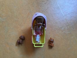 Baby in Kinderwagen