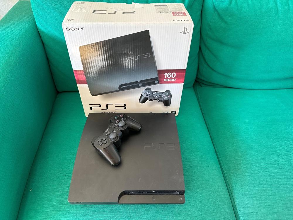 Console PlayStation 3 avec sa boite