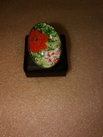 RING EDELSTHAL,,,MIT ROT BLUME,,,GLANZIG