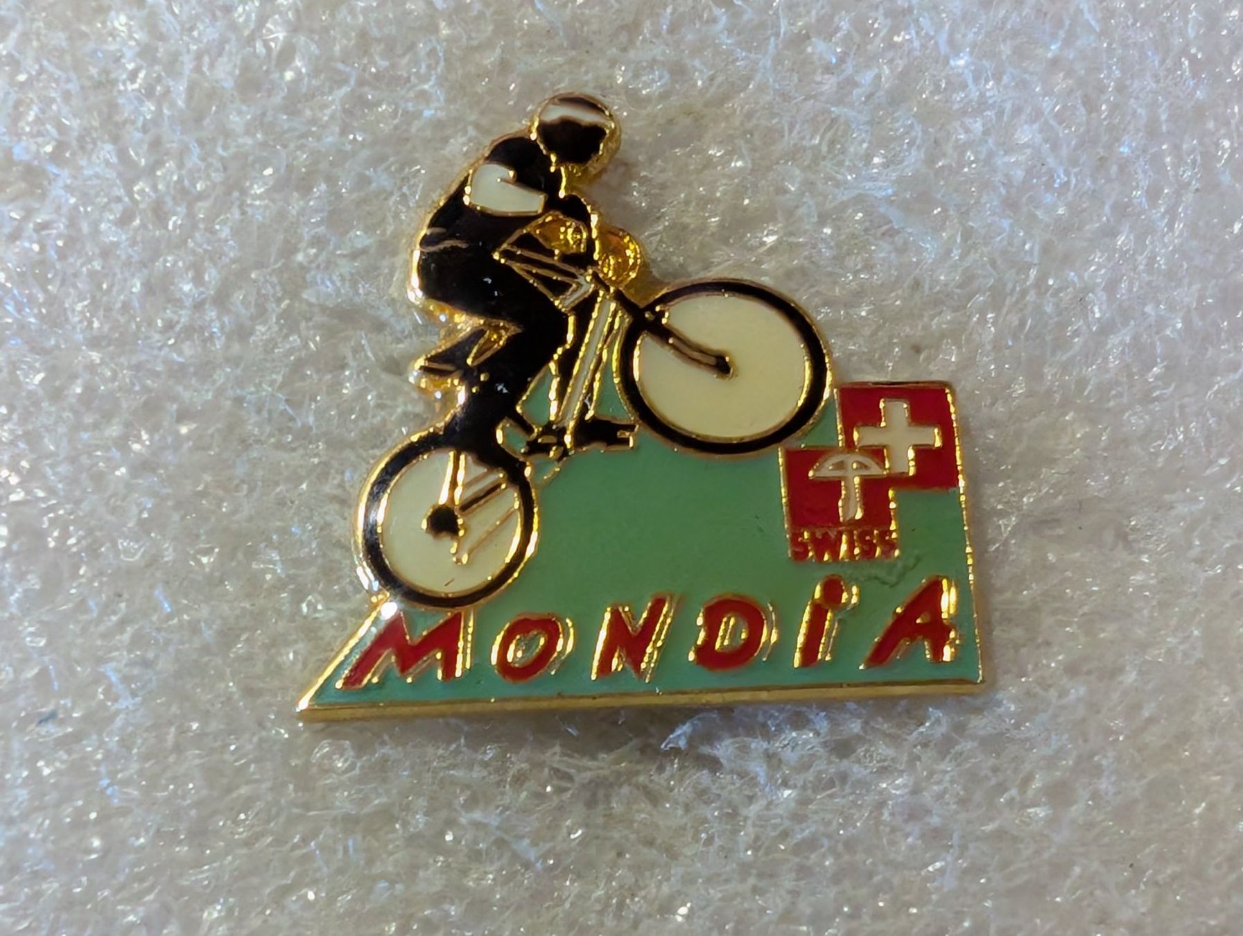 Placchette & Badge: Ansteckpin 25: Mondia – Usato da Oppligen venduto da Pin-Fall-Shop