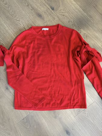 Pull avec noeuds sur les manches rouge Claudie pierlot