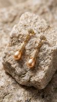 Boucles d'oreilles perles dorées