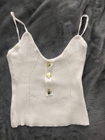 Top court blanc boutons dorés