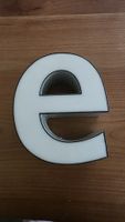 Kleines "e" aus Werbeschrift