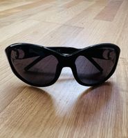 Lunettes de soleil noires femme