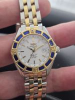 Magnifique Breitling Lady J acier or diamètre 31 mm plongée