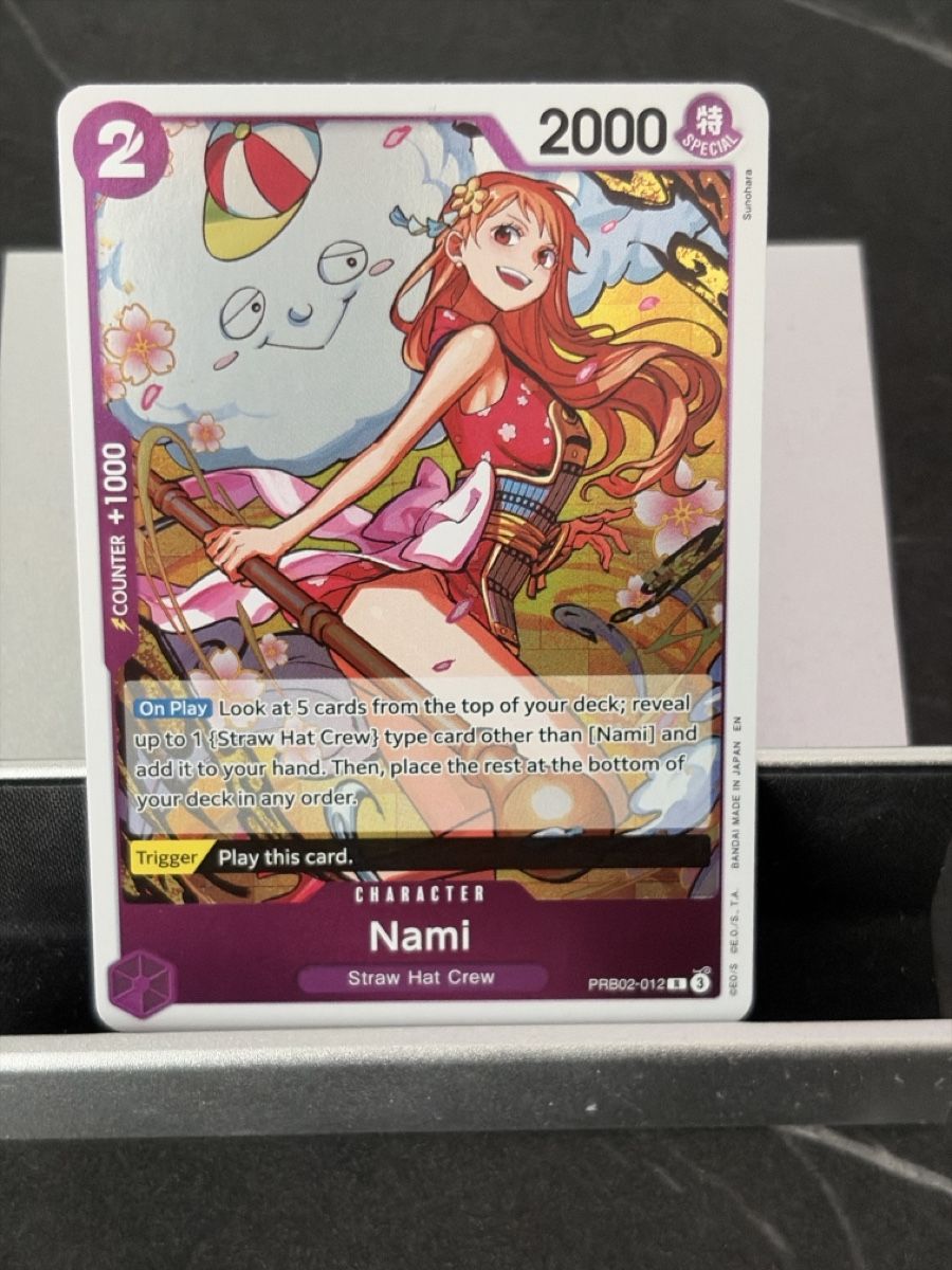 Bandai Carte collezionabili: One Piece PRB02-012 Nami, Englisch – Nuovo (secondo la descrizione) da St. Gallen venduto da cambitcg