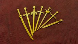 Deko Mini Schwerter 7stk. Set. golden