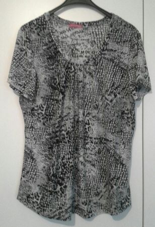 Très joli haut dans des tons gris, en taille 44-46