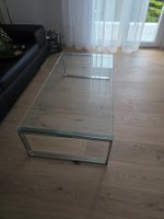 Tisch zu Polstergruppe