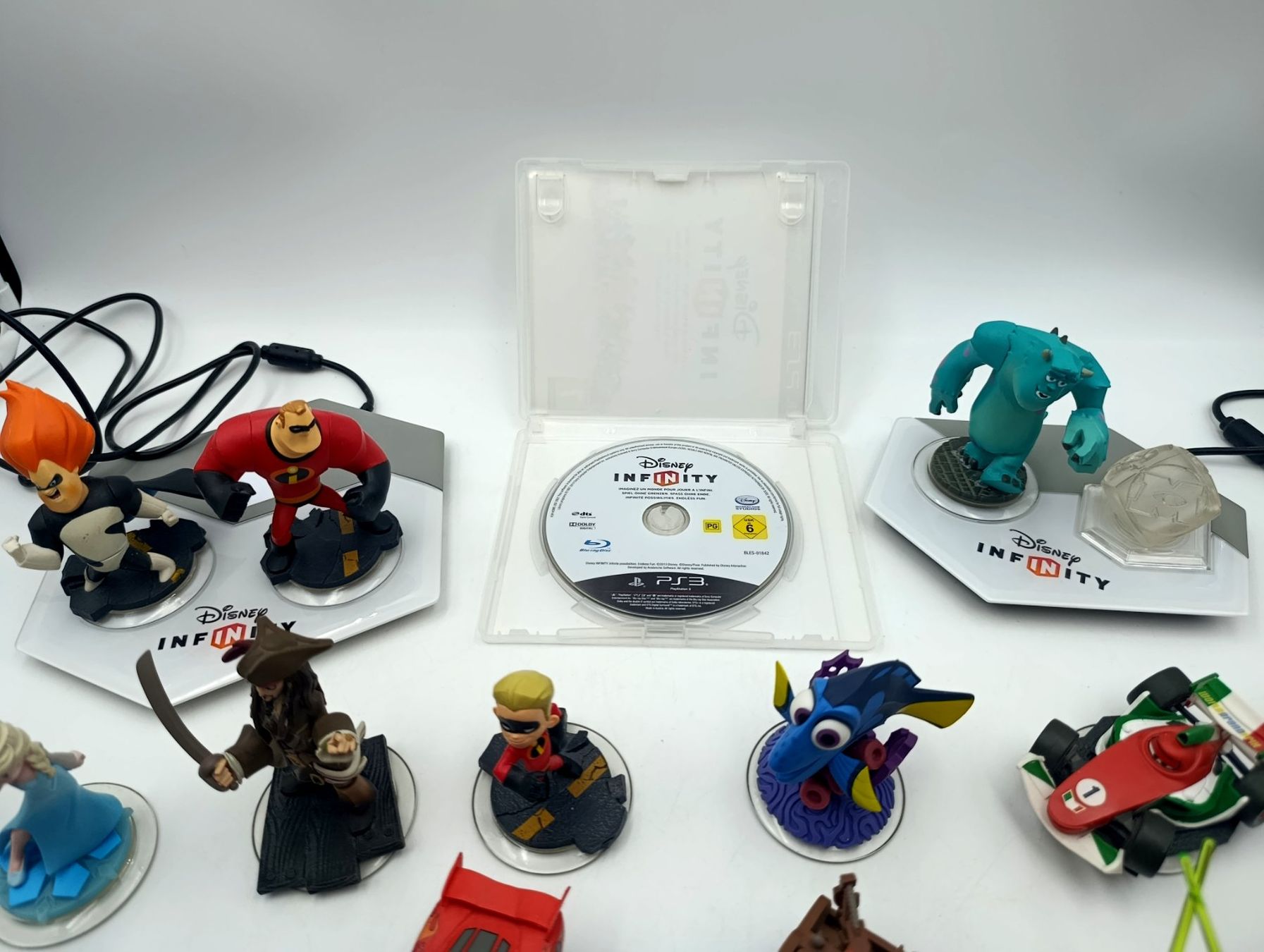 Disney Giochi: Disney Infinity Figuren und Spiel PS3 Konvolut – Usato da Wil SG venduto da Donaldus 3