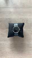 Elegante Calvin Klein Damenuhr mit Wickelarmband, Schwarz