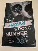 Buch "The Pucking Wrong Number" von C.R. Jane