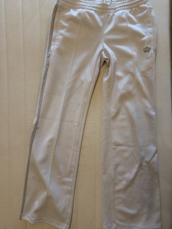 Pantalon de sport blanc avec bandes grises. Taille M