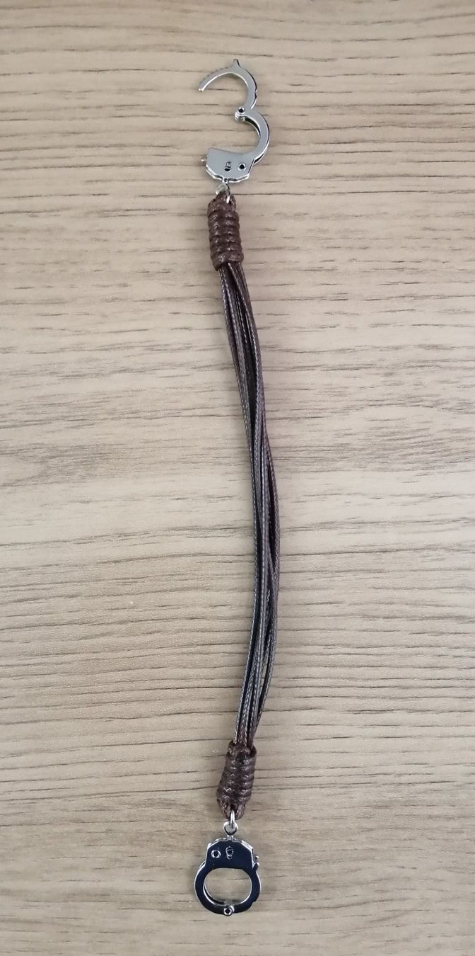 Armbänder & -reifen: Seltenes Armband mit Handschellen – Neu und originalverpackt aus Bern von Prasolux 1