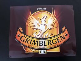 Plaque métal Grimbergen Phoenix en bon état.