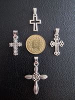 4 croix argentées, + trèfle à 4 feuilles