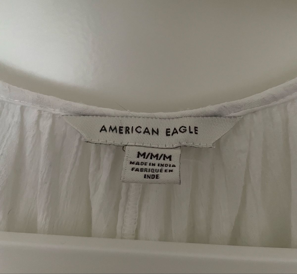 Blusen: Blouse American Eagle blanche  – Neu (gemäss Beschreibung) aus Villars-le-Grand von Scaoli 1