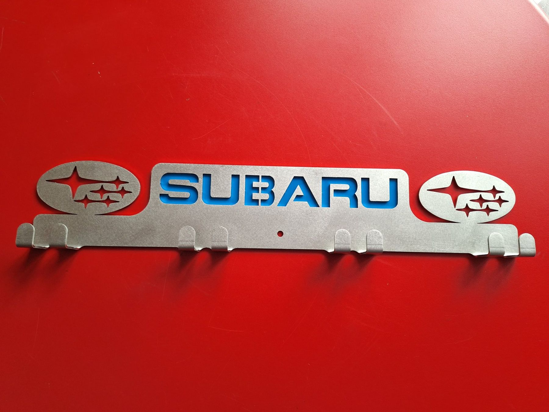 Subaru Automobili: Garderobe mit Subaru-Logo – Nuovo (secondo la descrizione) da Marbach LU venduto da seven014