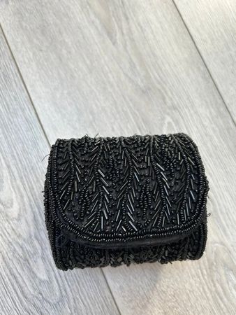 Petite pochette à paillettes noir