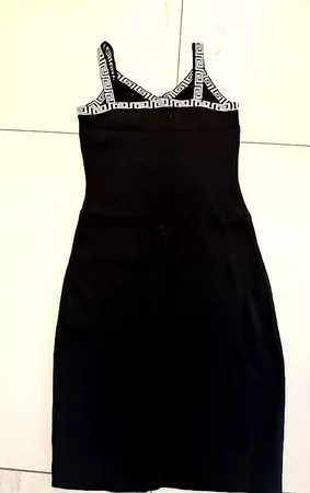 Jupe noire avec jarretelles intégrées, motif grec blanc