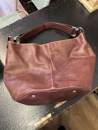 Coccinelle Handtasche aus Leder, bordeauxrot,