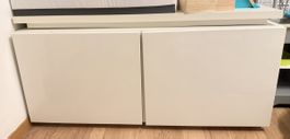 White storage unit with doors, perfect for any room