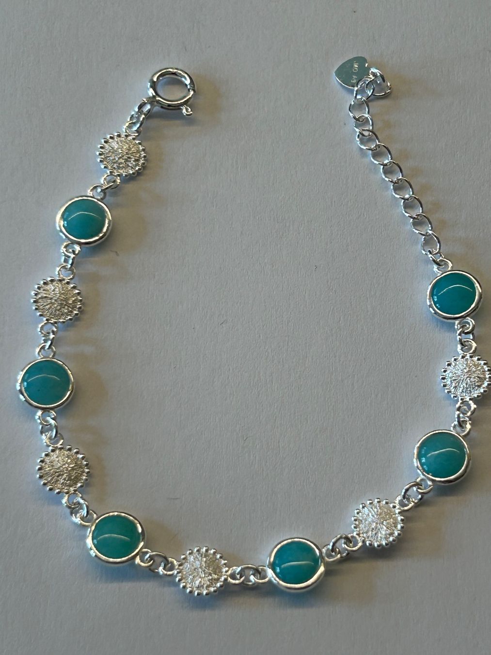 Bracciali & Braccialetti: Armband aus Sterling Silber & Amazonit Steinen – Nuovo e nell'imballaggio originale da Innertkirchen venduto da Glatthard-Interior