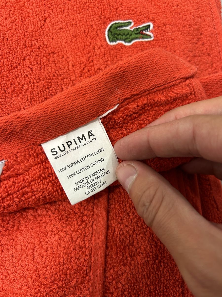 Lacoste Serviettes de bain: Lacoste Badetuch orange – D'occasion à Bern par floorball_zoro 2
