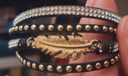 Bracelet jonc femme plume strass clous doré noir